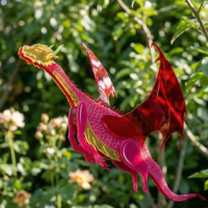 Colorful acrylic dragon sculpture in garden